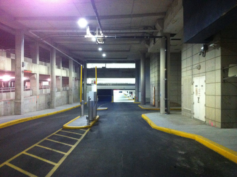 This is the Ramp Down into Parkade E - Level P1, from the North Side of the Mall, Near the Theatre